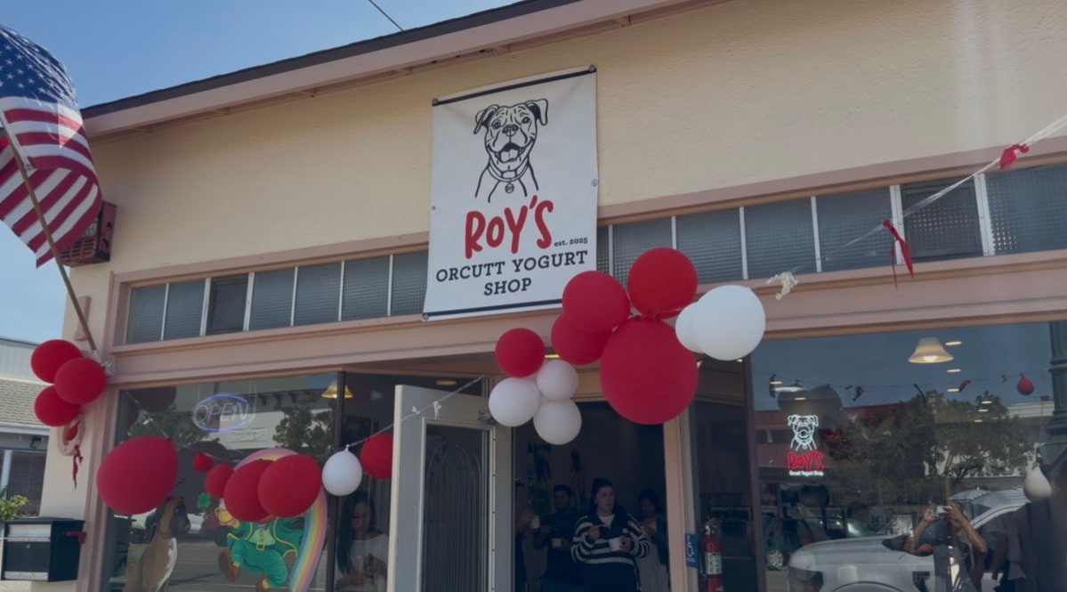 ROY’S storefront decorated for its grand opening